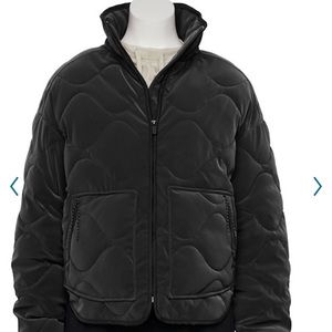 Quilted black activewear jacket.